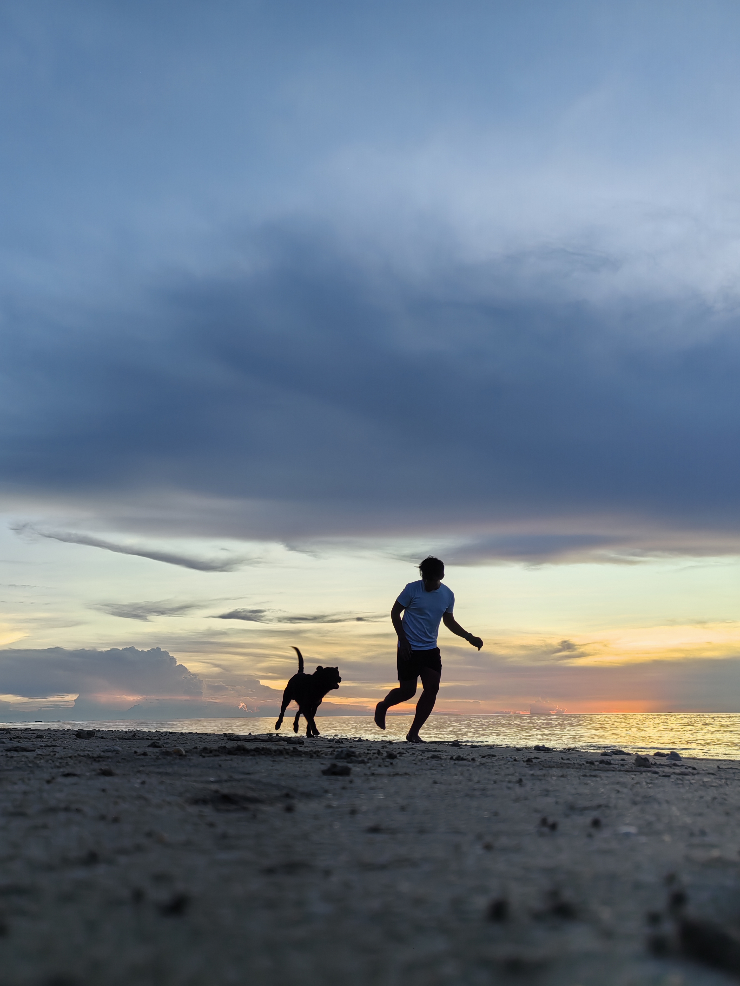 A quiet outdoor moment with KuyaWen and his dog